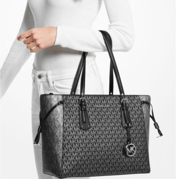 Michael Kors Handbags - Michael Kors Voyager Black Multi Signature Tote